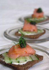 Smoked Salmon on Potato Blini with Caviar and Crème Fraiche